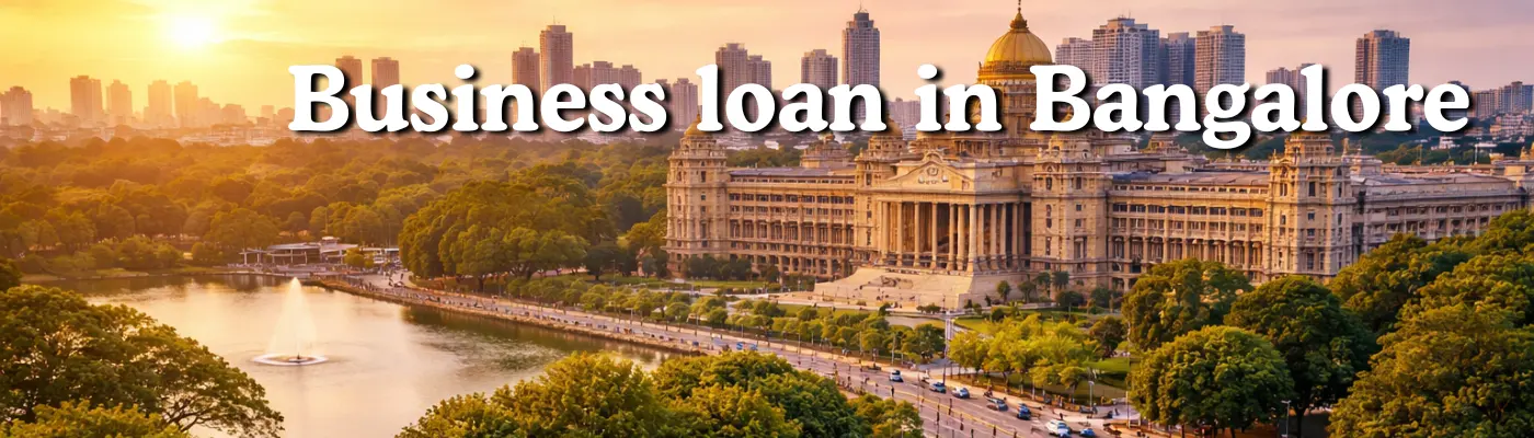 **Alt text:** Business loan in Bangalore banner with Vidhana Soudha, city skyline, and lake view at sunset